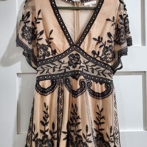 Nude and black lace romper